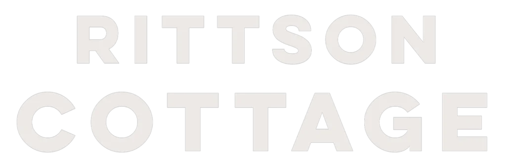 Rittson Cottage logo, quirky riverside holiday cottage in Eamont Bridge