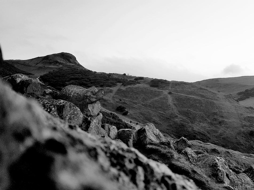 Rocky mountain trail through dramatic fell scenery near the Lake District
